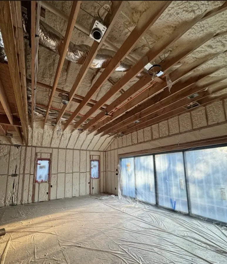 Interior walls and ceiling insulated with spray foam during new construction in Indianapolis